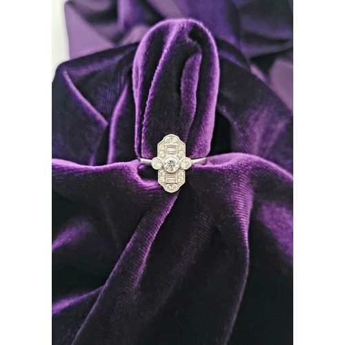 13 - AN ART DECO INSPIRED DIAMOND RING, in the classical Art Deco design with a mix of baguette and round... 