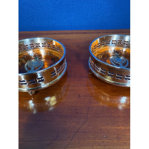 191 - A PAIR OF GOOD CONTEMPORARY WINE COASTERS, with pierced raised gallery sides and a faux tortoiseshel... 