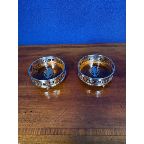 191 - A PAIR OF GOOD CONTEMPORARY WINE COASTERS, with pierced raised gallery sides and a faux tortoiseshel... 