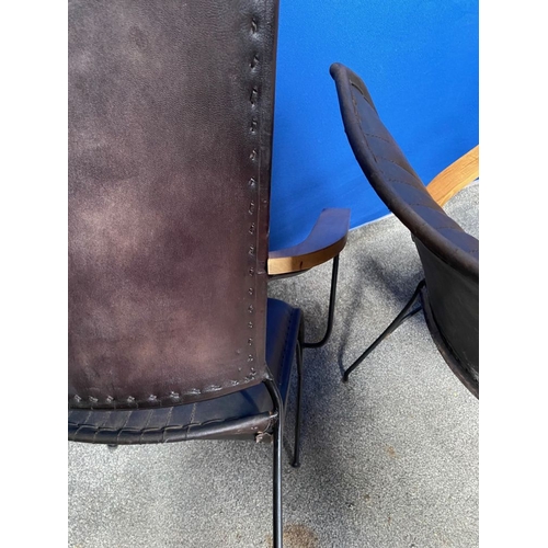 229 - A PAIR OF CONTEMPORARY STEEL FRAMED DARK LEATHER UPHOLSTERED ARMCHAIRS, nice, stitched detailing to ... 