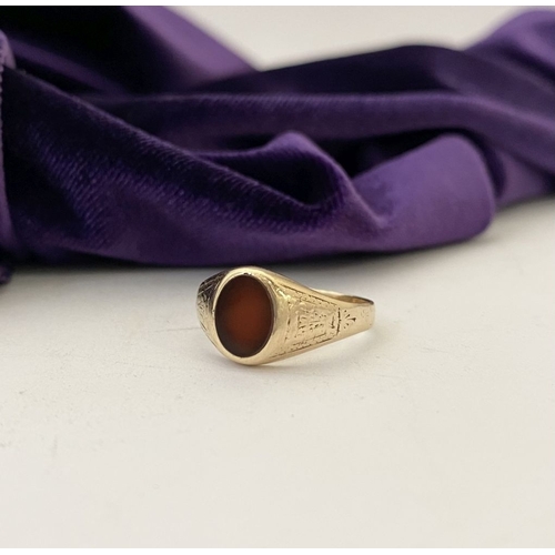 105 - A BEAUTIFUL IRISH 9CT GOLD CARNELIAN SIGNET RING, c.1961, oval carnelian, the tapered shoulders with... 