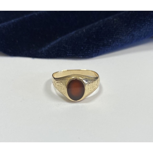 105 - A BEAUTIFUL IRISH 9CT GOLD CARNELIAN SIGNET RING, c.1961, oval carnelian, the tapered shoulders with... 