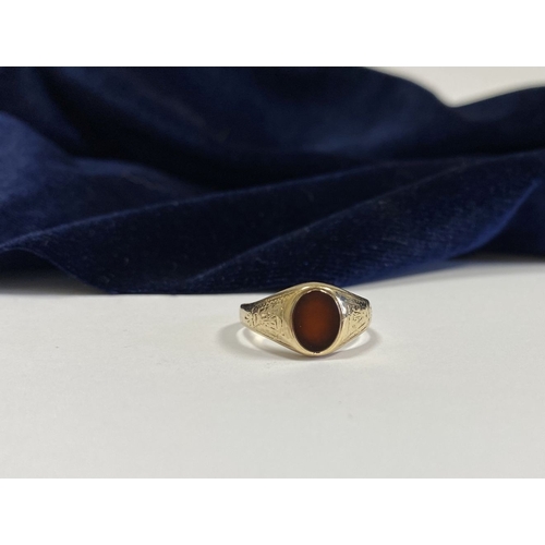 105 - A BEAUTIFUL IRISH 9CT GOLD CARNELIAN SIGNET RING, c.1961, oval carnelian, the tapered shoulders with... 