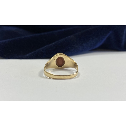 105 - A BEAUTIFUL IRISH 9CT GOLD CARNELIAN SIGNET RING, c.1961, oval carnelian, the tapered shoulders with... 