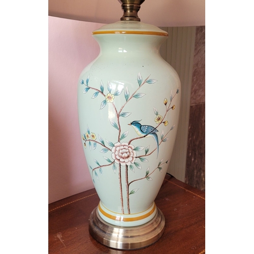 110 - A GOOD CONTEMPORARY BIRD SHELL BLUE TABLE LAMP, decorated with a floral and bird design. Complete wi... 