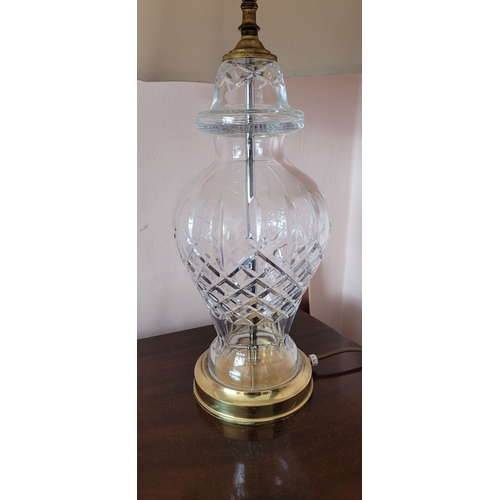 112 - A CONTEMPORARY CUT GLASS TABLE LAMP, with shade. Currently in working order. 67cm tall including sha... 