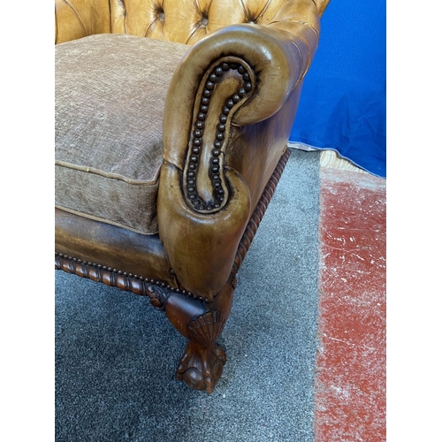 125 - AN EXCELLENT QUALITY PAIR OF TAN LEATHER CHESTERFIELD WINGBACK ARMCHAIRS, each with nice deep button... 