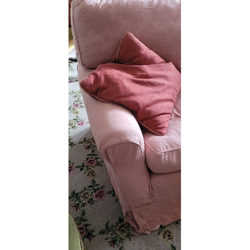 126 - A FOUR PERSON UPHOLSTERED COUCH, with cushioned back & seats. In good condition, the covers could be... 