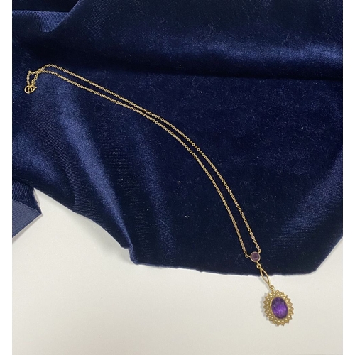 132 - A BEAUTIFUL 9CT GOLD AMETHYST AND SEED PEARL PENDANT NECKLACE, with central large oval cut vibrant a... 