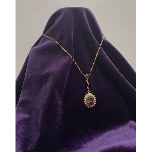 132 - A BEAUTIFUL 9CT GOLD AMETHYST AND SEED PEARL PENDANT NECKLACE, with central large oval cut vibrant a... 