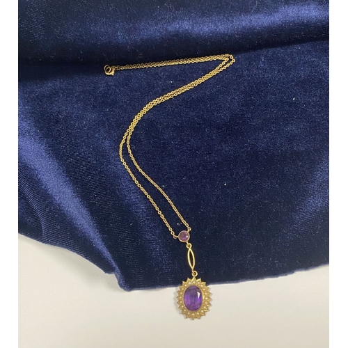 132 - A BEAUTIFUL 9CT GOLD AMETHYST AND SEED PEARL PENDANT NECKLACE, with central large oval cut vibrant a... 