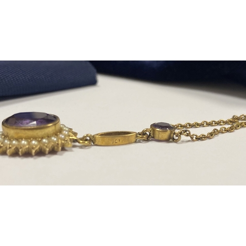 132 - A BEAUTIFUL 9CT GOLD AMETHYST AND SEED PEARL PENDANT NECKLACE, with central large oval cut vibrant a... 