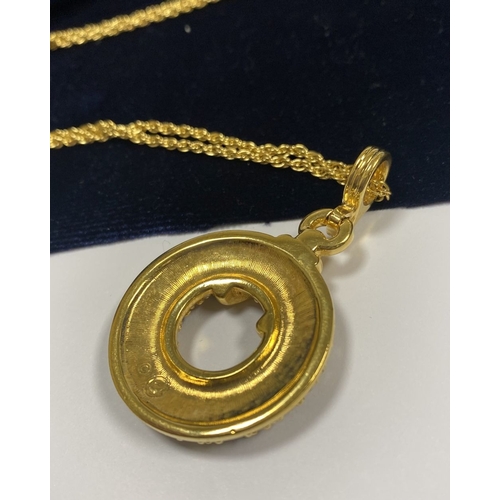 138 - A BEAUTIFUL SWAROVSKI CRYSTAL NECKLACE, c.1990, signed to reverse pendant, gold tone, the circular p... 