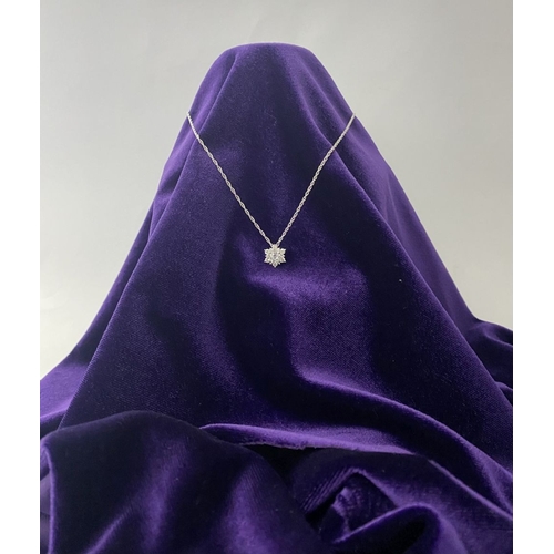 147 - A DAINTY STERLING SILVER CUBIC ZIRCONIA PENDANT NECKLACE, the pendant with large central cubic zirco... 