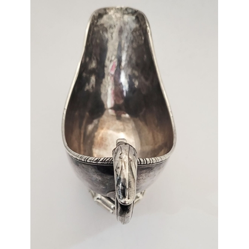 16 - AN EARLY GEORGE III IRISH SILVER SAUCE BOAT, by Richard Williams, c.1760.  Nice simple form with ree... 