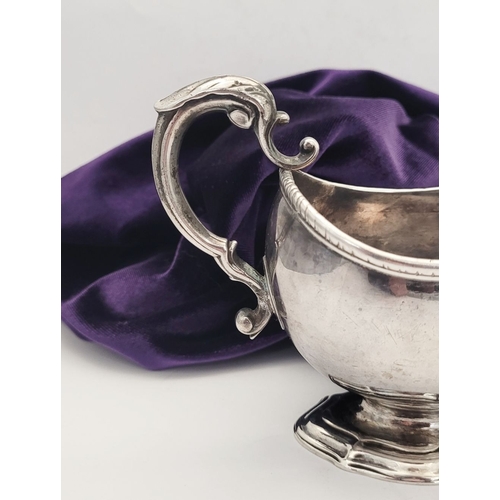 16 - AN EARLY GEORGE III IRISH SILVER SAUCE BOAT, by Richard Williams, c.1760.  Nice simple form with ree... 