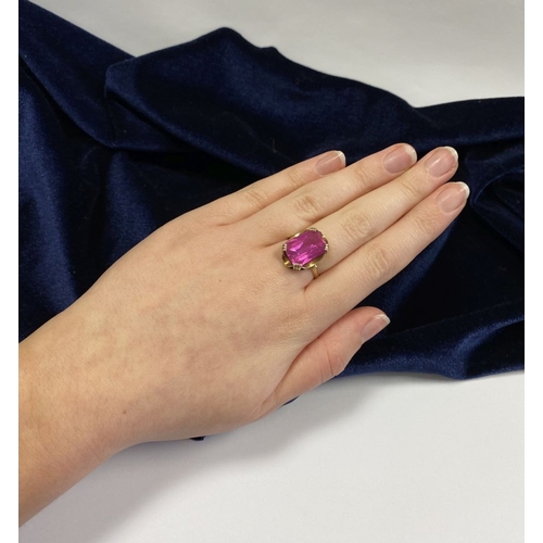 176 - A BEAUTIFUL IRISH 9CT YELLOW GOLD PINK GEMSTONE SOLITAIRE RING, with large vibrant emerald cut pink ... 