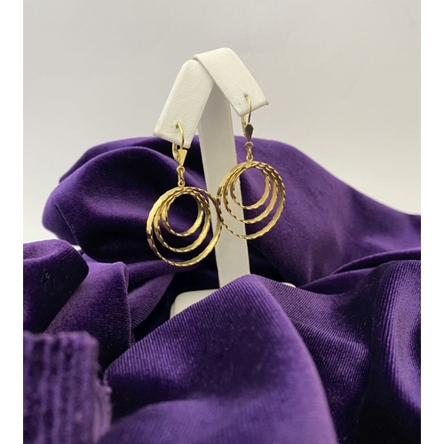 177 - A LOVELY PAIR OF ROLLED GOLD TRIPLE HOOP EARRINGS, hallmarked RG to clasp. Nice textured design to t... 