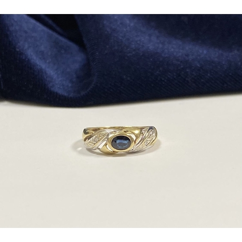 183 - A BEAUTIFUL 9CT GOLD SAPPHIRE & DIAMOND DRESS RING, with central oval cut vibrant sapphire in bezel ... 