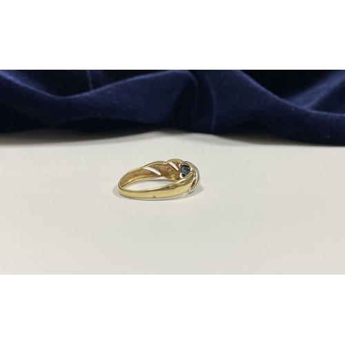 183 - A BEAUTIFUL 9CT GOLD SAPPHIRE & DIAMOND DRESS RING, with central oval cut vibrant sapphire in bezel ... 