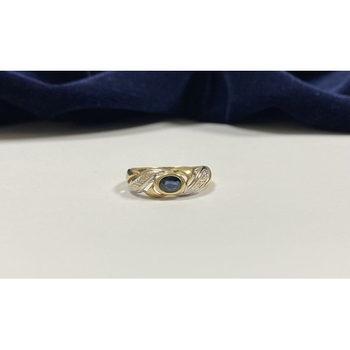 183 - A BEAUTIFUL 9CT GOLD SAPPHIRE & DIAMOND DRESS RING, with central oval cut vibrant sapphire in bezel ... 