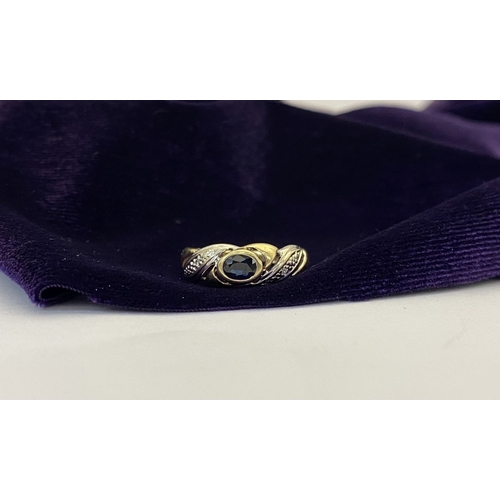 183 - A BEAUTIFUL 9CT GOLD SAPPHIRE & DIAMOND DRESS RING, with central oval cut vibrant sapphire in bezel ... 