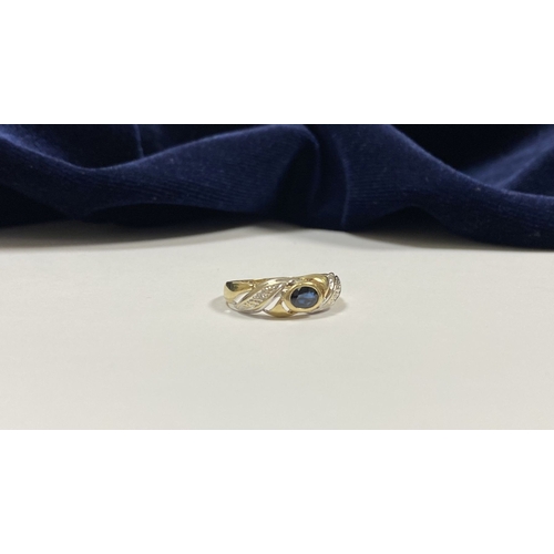 183 - A BEAUTIFUL 9CT GOLD SAPPHIRE & DIAMOND DRESS RING, with central oval cut vibrant sapphire in bezel ... 