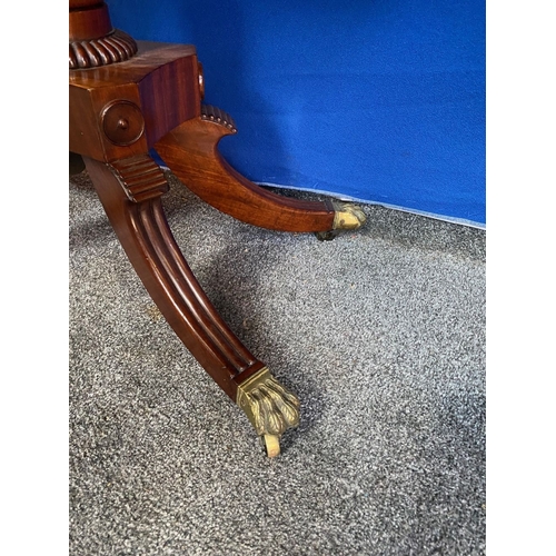 184 - A GOOD QUALITY REGENCY MAHOGANY CARD TABLE, the top with canted corners, opening to green baize line... 