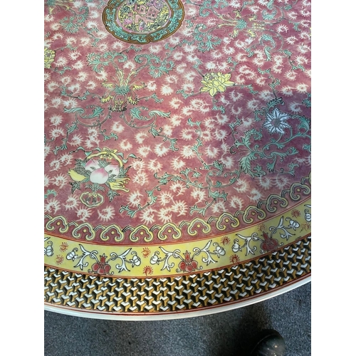 194 - A BEAUTIFUL FAMILLE ROSE CHINESE SIDE/BISTRO TABLE, the circular top finely decorated with central m... 