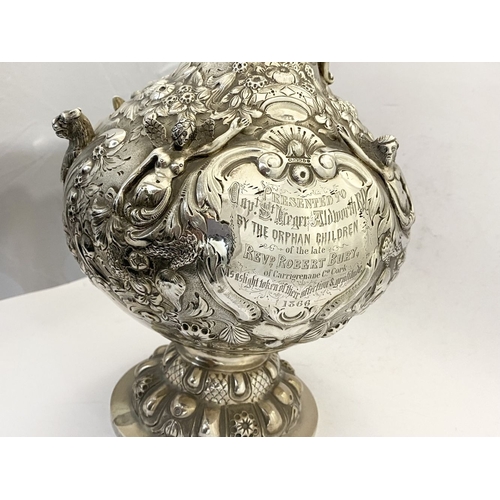 2 - AN IMPRESSIVE HISTORICAL IRISH SILVER ARMADA JUG, Dublin c.1866. The front engraved with presentatio... 