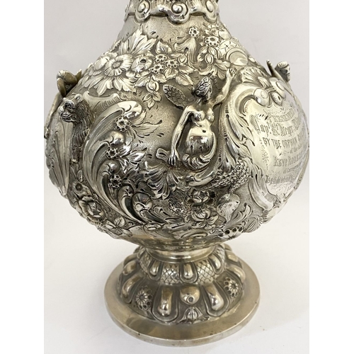 2 - AN IMPRESSIVE HISTORICAL IRISH SILVER ARMADA JUG, Dublin c.1866. The front engraved with presentatio... 