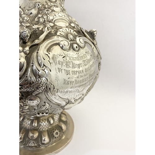 2 - AN IMPRESSIVE HISTORICAL IRISH SILVER ARMADA JUG, Dublin c.1866. The front engraved with presentatio... 