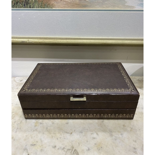 206 - A LARGE VINTAGE MELE STYLE JEWELLERY BOX, leather look exterior with gilt details, opening to fitted... 