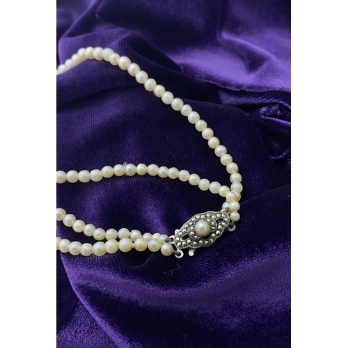 217 - TWO LOVELY IMITATION PEARL NECKLACES, (i) double strand with imitation pearls graduating in size fro... 