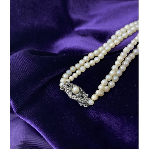 217 - TWO LOVELY IMITATION PEARL NECKLACES, (i) double strand with imitation pearls graduating in size fro... 