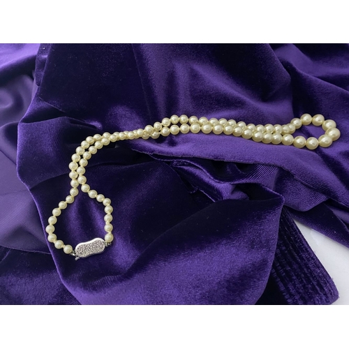 217 - TWO LOVELY IMITATION PEARL NECKLACES, (i) double strand with imitation pearls graduating in size fro... 