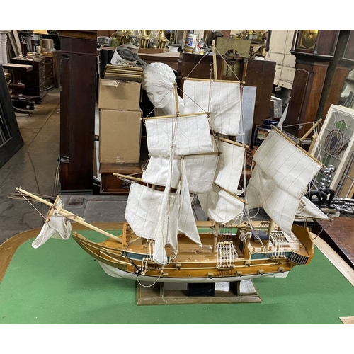 222 - A VINTAGE MODEL OF A SHIP, on base, some restoration needed, masts in need of resetting etc. Dimensi... 