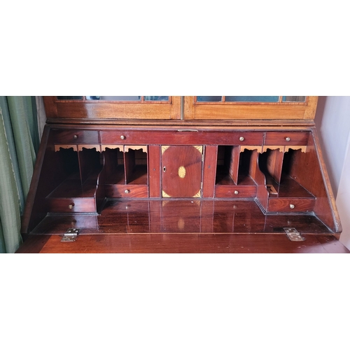 23 - A VERY FINE ASTRAGAL GLAZED GEORGIAN MAHOGANY & SATINWOOD INLAID BUREAU BOOKCASE, the top pediment w... 