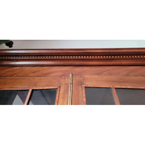 23 - A VERY FINE ASTRAGAL GLAZED GEORGIAN MAHOGANY & SATINWOOD INLAID BUREAU BOOKCASE, the top pediment w... 