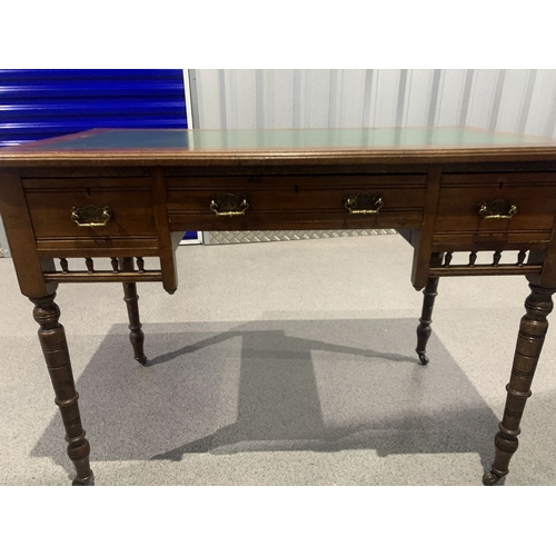 234 - A VICTORIAN MAHOGANY WRITING DESK, with leather lining to top, fluted border, above one long drawer ... 