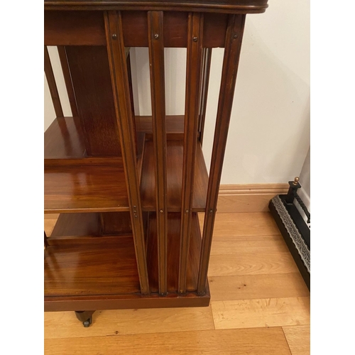 249 - A MAHOGANY INLAID REVOLVING BOOKCASE, the top with central circular inlaid panel surrounded by furth... 