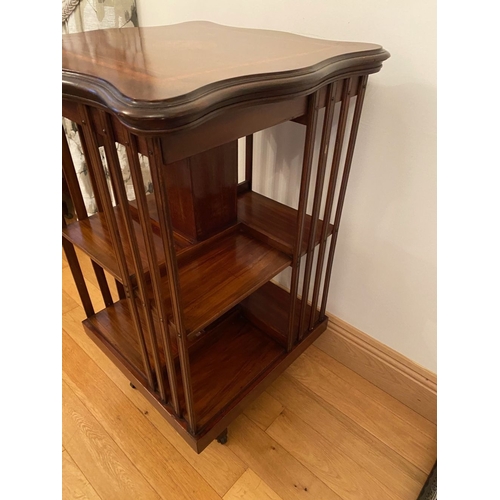 249 - A MAHOGANY INLAID REVOLVING BOOKCASE, the top with central circular inlaid panel surrounded by furth... 