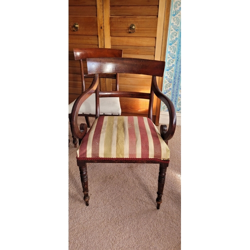 259 - A SET OF FIVE REGENCY MAHOGANY DINING CHAIRS, includes two carvers: each with typical Regency style ... 