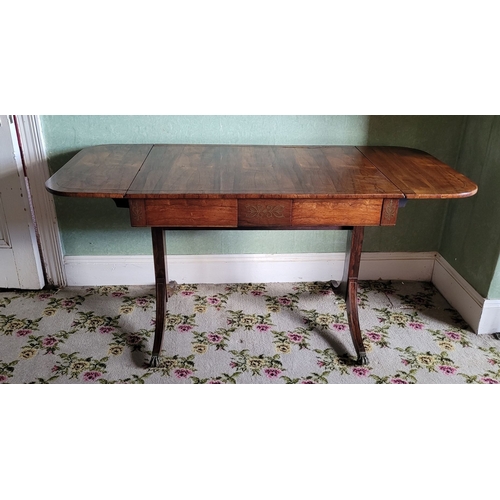 26 - A VERY GOOD QUALITY REGENCY ROSEWOOD BRASS INLAID SOFA TABLE, the curved leaves on each side raised ... 