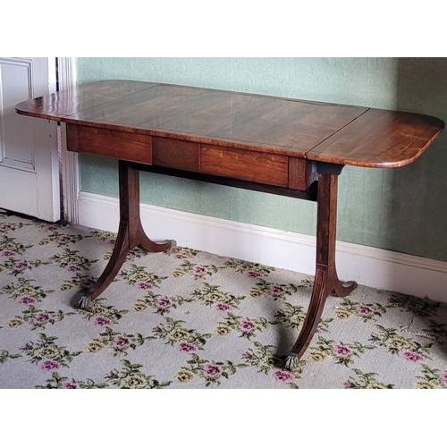 26 - A VERY GOOD QUALITY REGENCY ROSEWOOD BRASS INLAID SOFA TABLE, the curved leaves on each side raised ... 