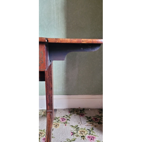 26 - A VERY GOOD QUALITY REGENCY ROSEWOOD BRASS INLAID SOFA TABLE, the curved leaves on each side raised ... 