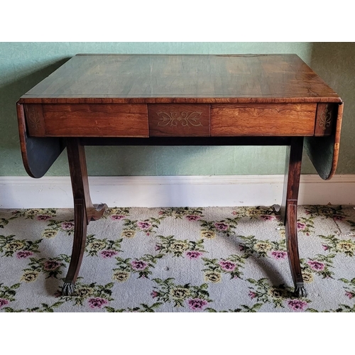 26 - A VERY GOOD QUALITY REGENCY ROSEWOOD BRASS INLAID SOFA TABLE, the curved leaves on each side raised ... 