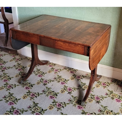 26 - A VERY GOOD QUALITY REGENCY ROSEWOOD BRASS INLAID SOFA TABLE, the curved leaves on each side raised ... 