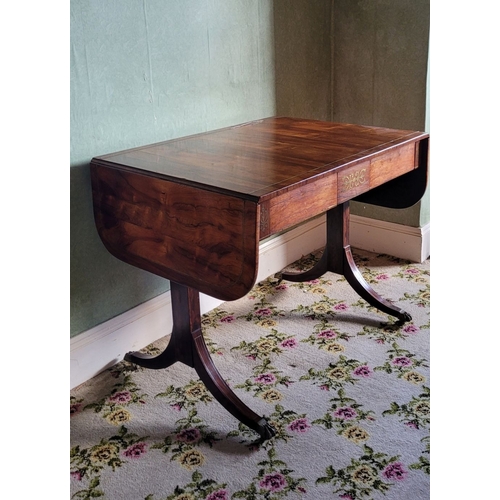 26 - A VERY GOOD QUALITY REGENCY ROSEWOOD BRASS INLAID SOFA TABLE, the curved leaves on each side raised ... 