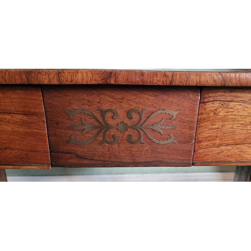 26 - A VERY GOOD QUALITY REGENCY ROSEWOOD BRASS INLAID SOFA TABLE, the curved leaves on each side raised ... 